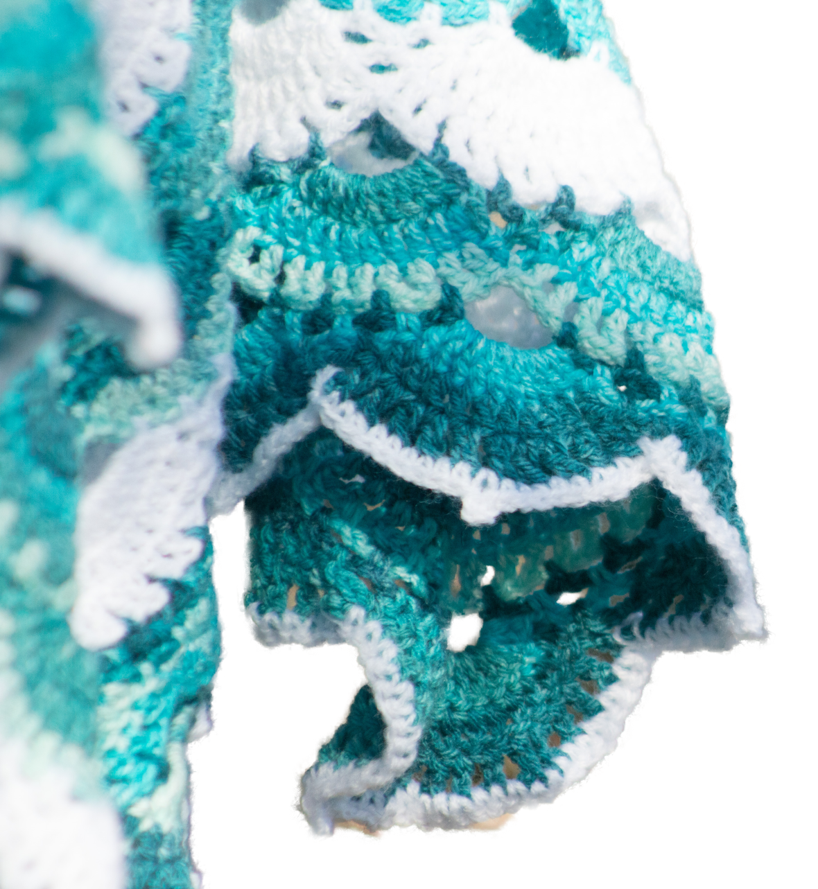 Blue /green sultry colours. Frothy white Waves and clear turquoise.